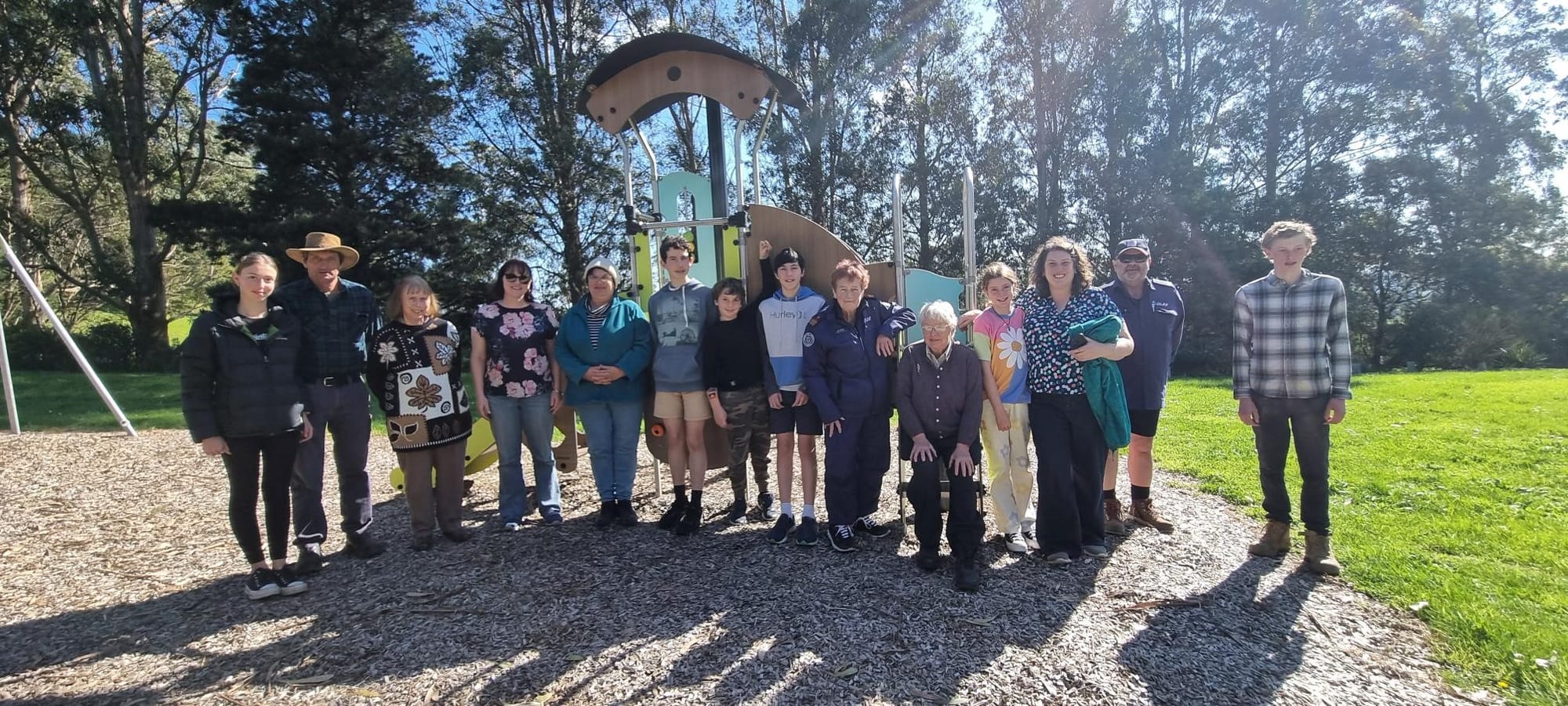 Helping out at the annual community day are (from left) Vanessa McDonald, Cameron McDonald, Jillian Amor, Jenny Mansfield, Linett McNamara, Damian McNamara, Coen Guy, Steven McNamara, Julie Ettery (CFA), Ann Bullen seated, Bronte Guy and Lyndal Guy Turner, Peter King (CFA) and Timothy McDonald
