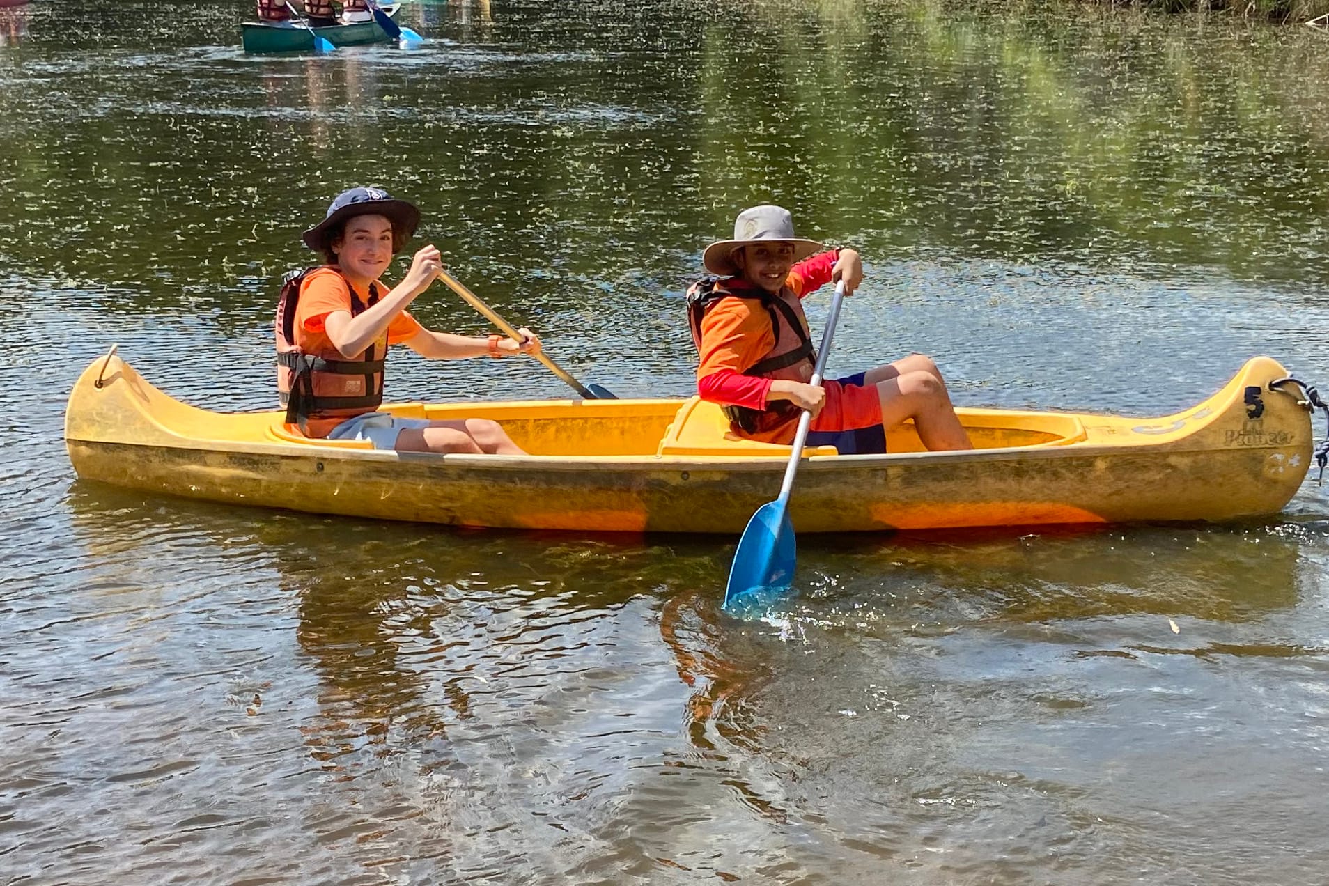 Paddling away at Camp Rumbug are St Paul's students Oliver Calabro and Laven Walia.
