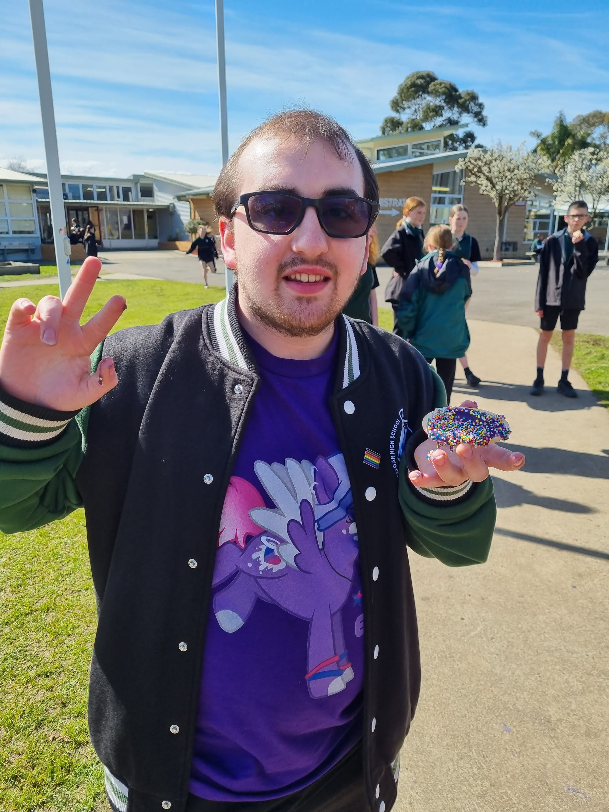 Year 12 student Blake Robinson brightens his uniform with some purple.