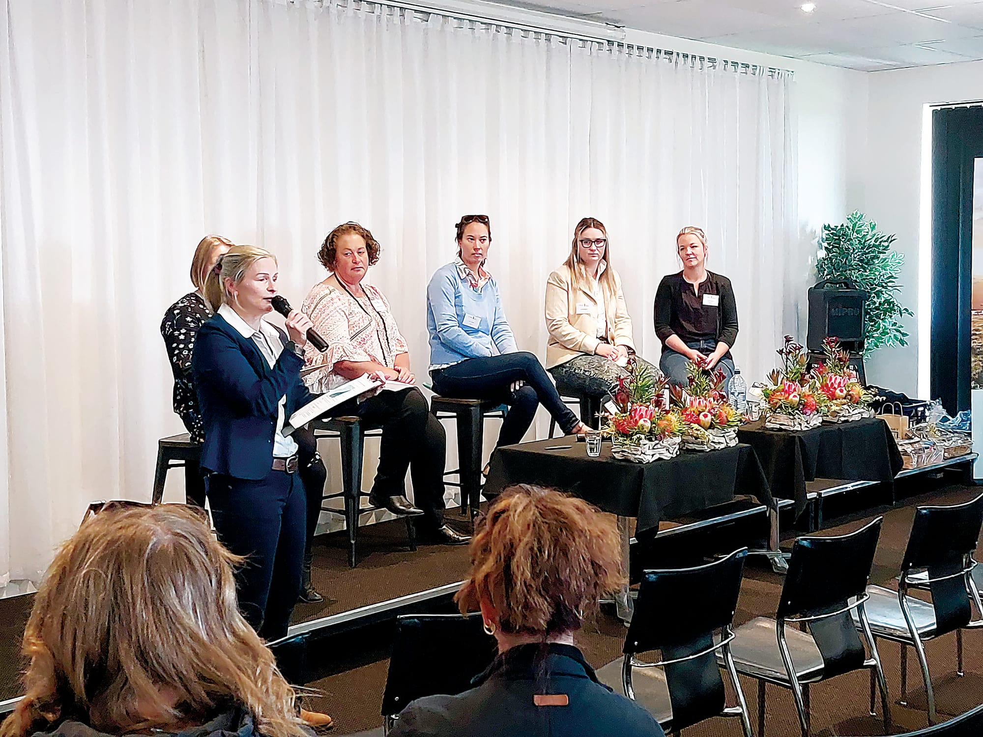 Women in dairy gather together