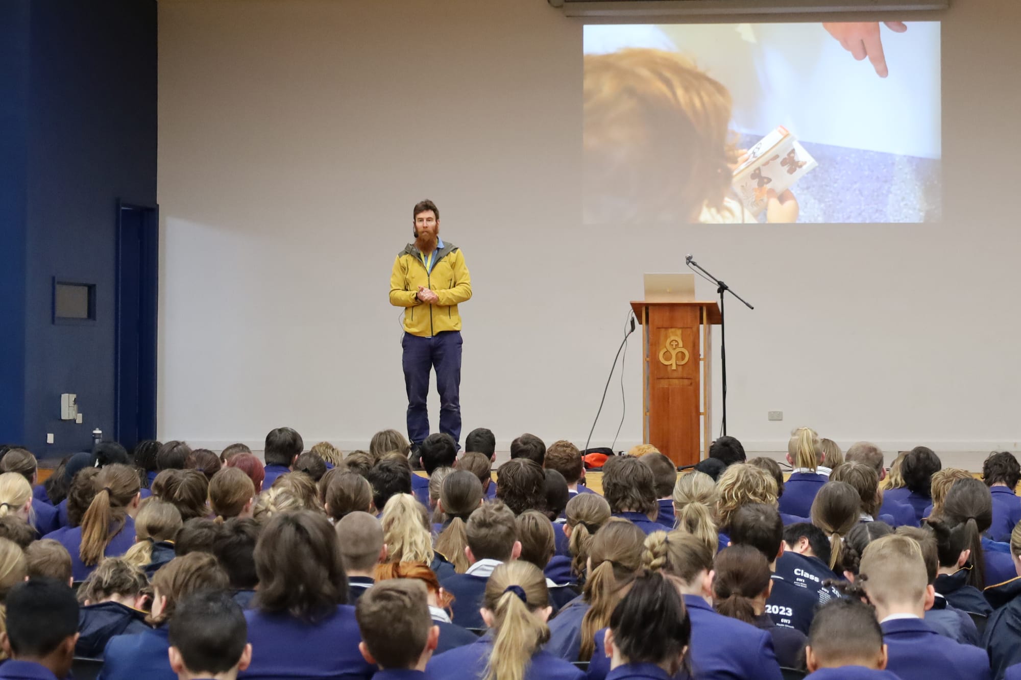 Beau Miles presents to St Pauls secondary students and year six students.