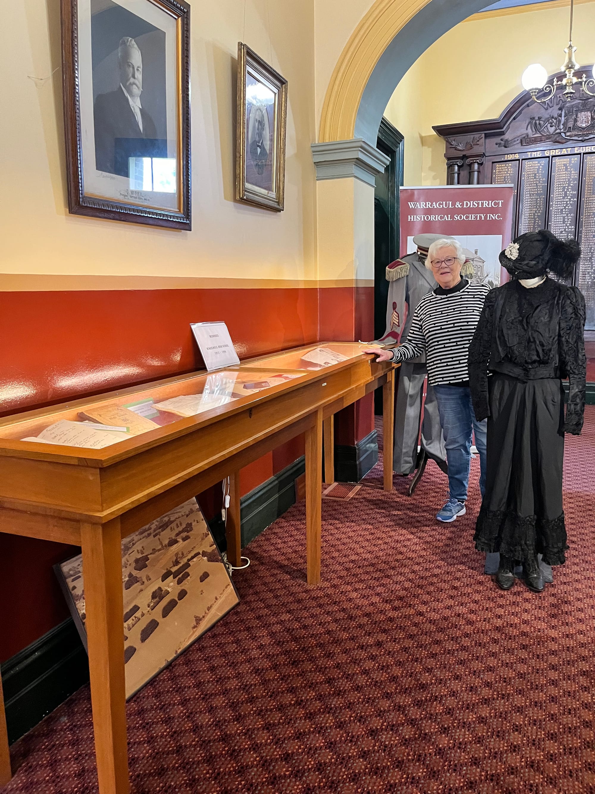 Warragul and District Historical Society president Jo Dickson with some of the exhibits on display at the Old Shire Hall.