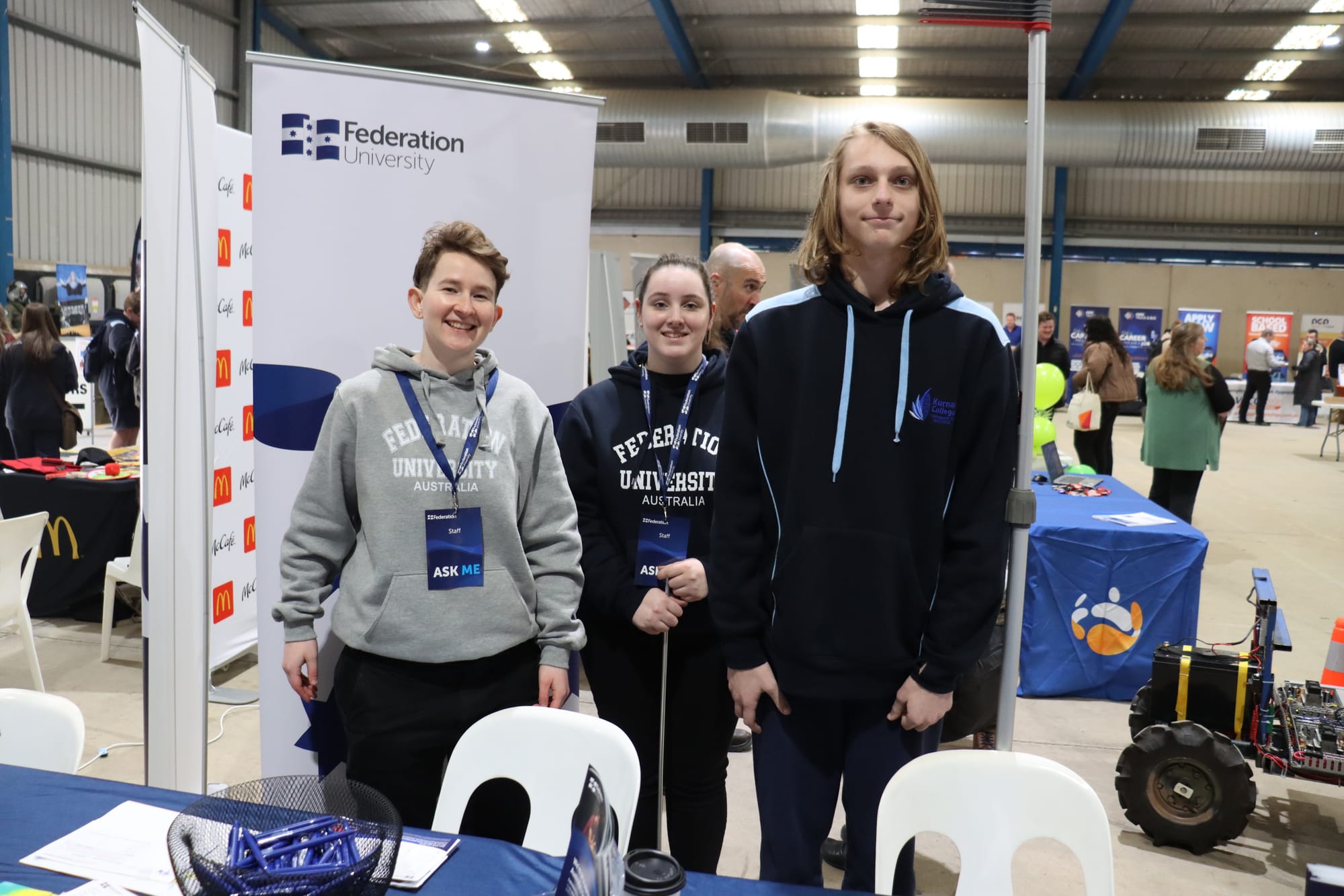 Federation University's Tegan West and Tahlia Ebery with Lavalla College student Logan Renton