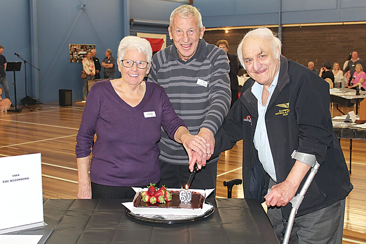 Cutting the 60th anniversary cake are life members Elaine Brew and Don Hastings as well as Ernie Matkovich, who played for the club in 1964.