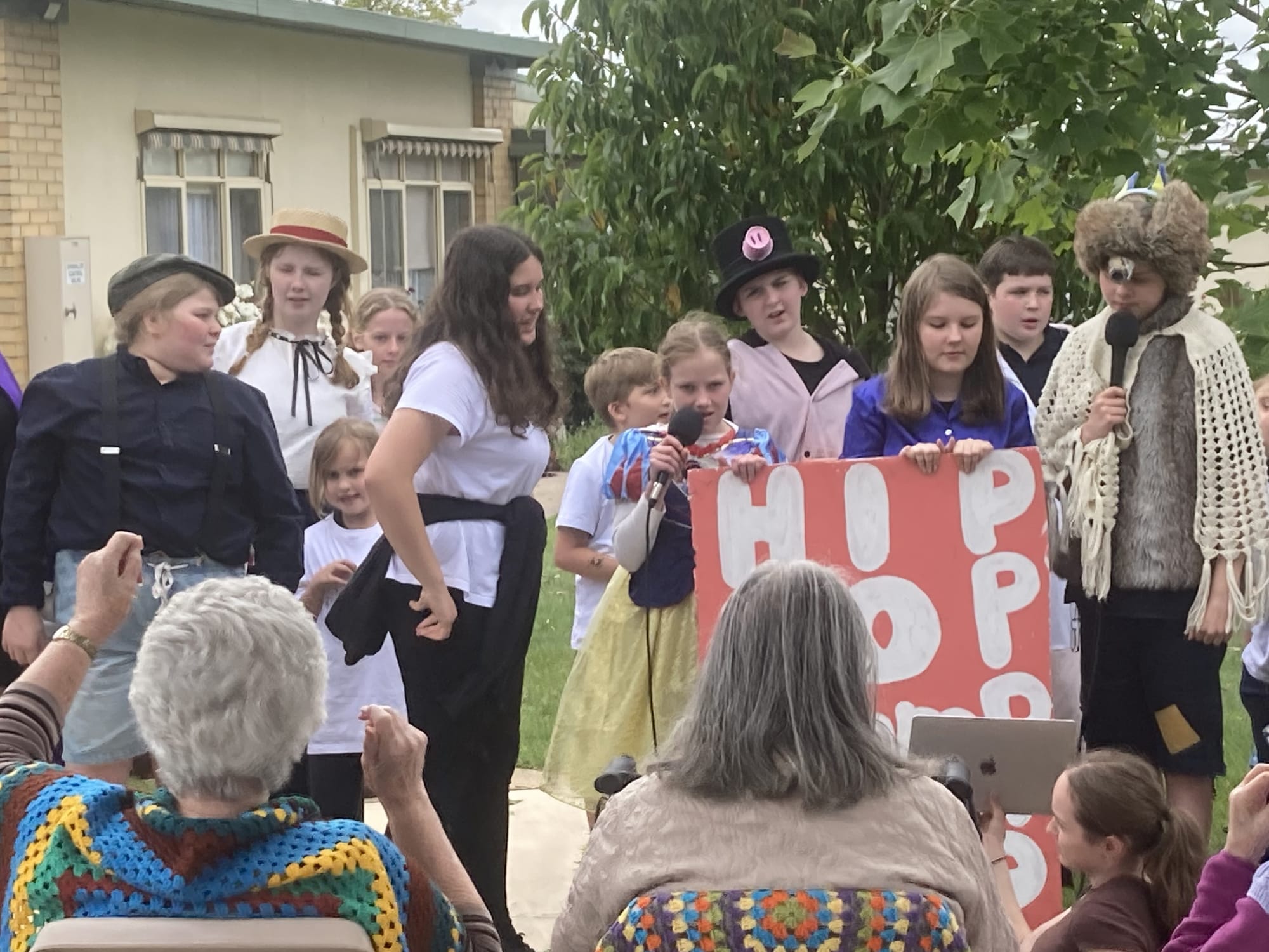 Bona Vista Primary School students performing for Fairview Village residents