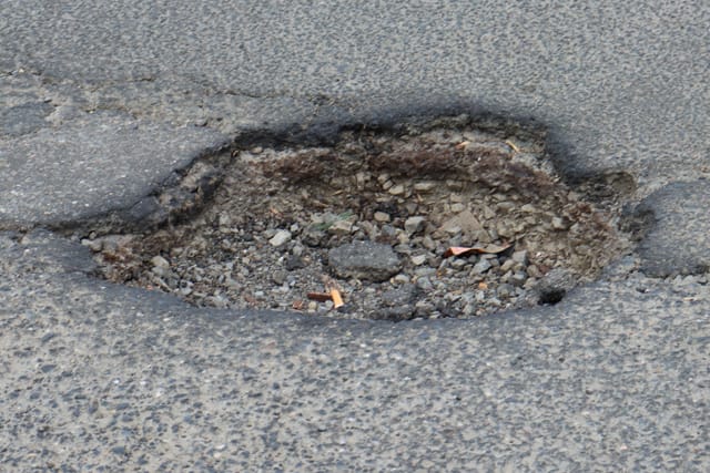 Pot Holes Woolies Carpark - 10.02.2022