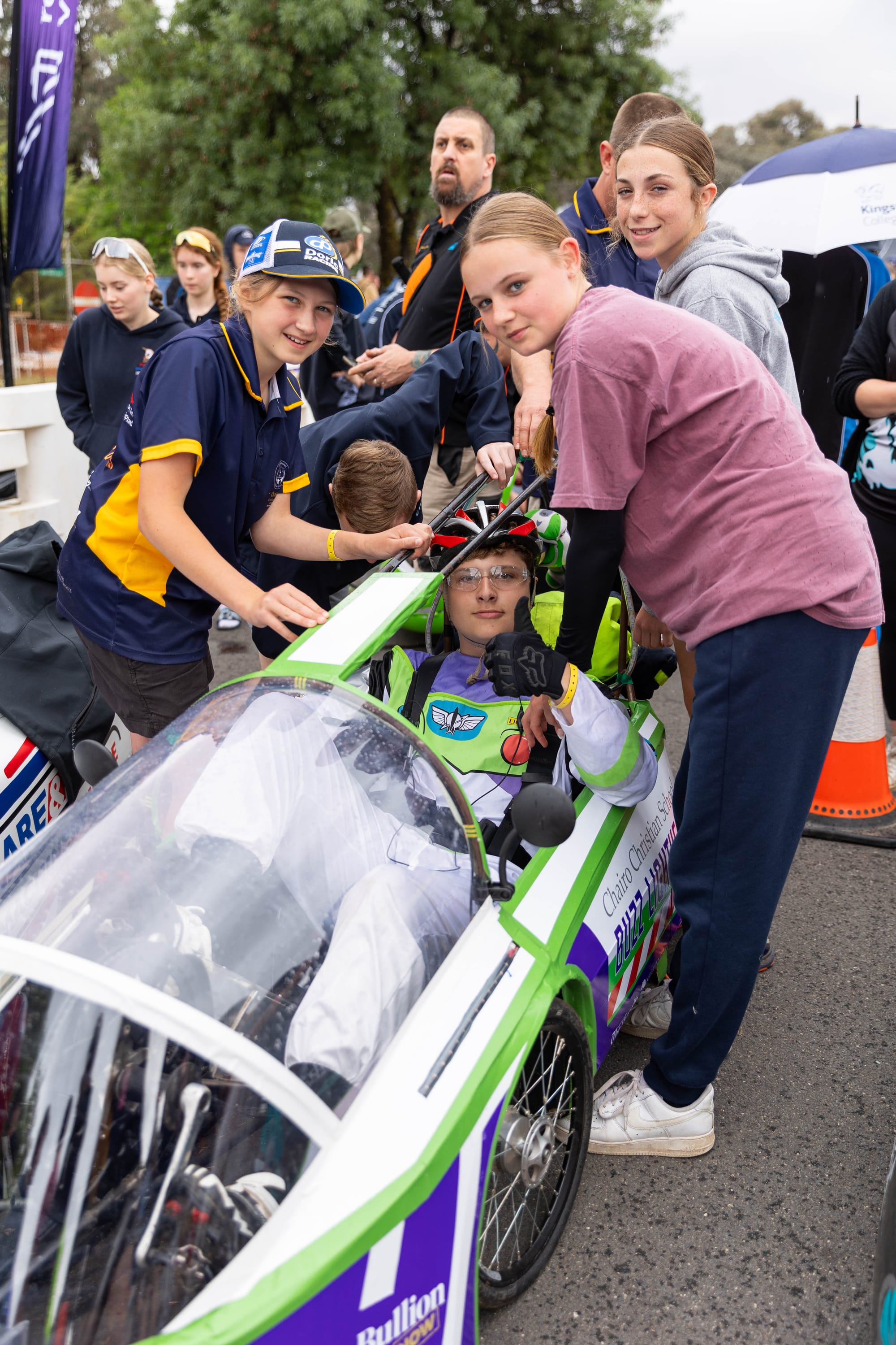 Thumbs up from driver Ben East and encouragement from Chair Cristian School team mates, from left, Violet Dodd, Charlotte Smith and Fiona Nalder as they wait the start of the 24-hour Energy Breakthrough event for energy efficient vehicles.