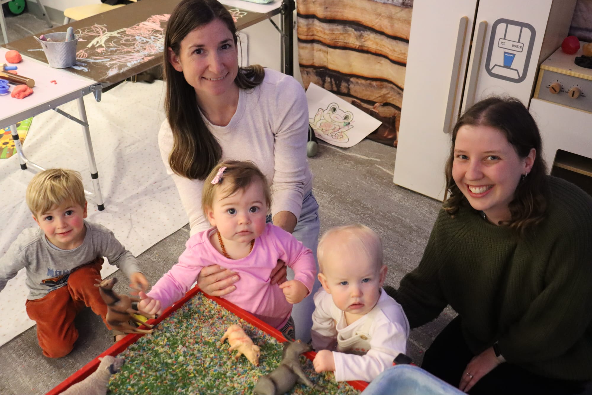 Mum's Rebecca McMullin and Elyse Young with their children (l-r) Reuben Greaves, Olive Greaves and Cassandra Young