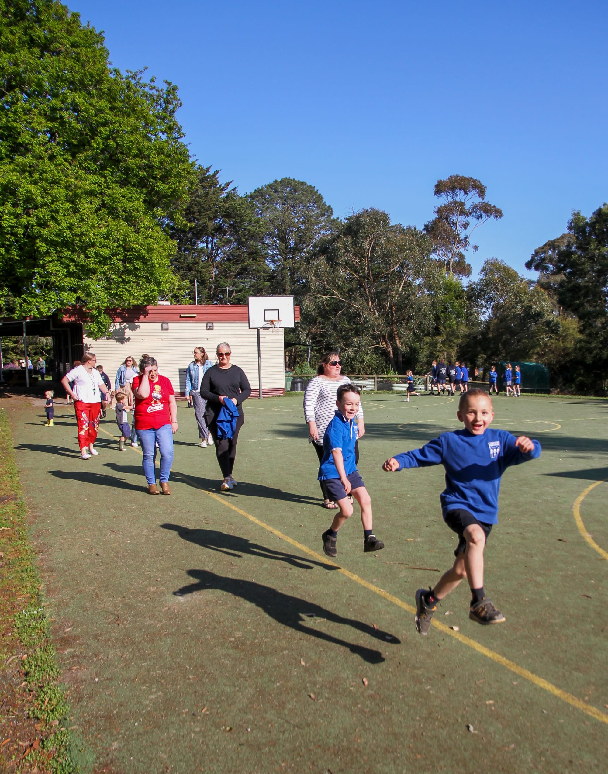 Darcy Crosby (right) and Spencer Hill lead the charge during the Walk to School event.