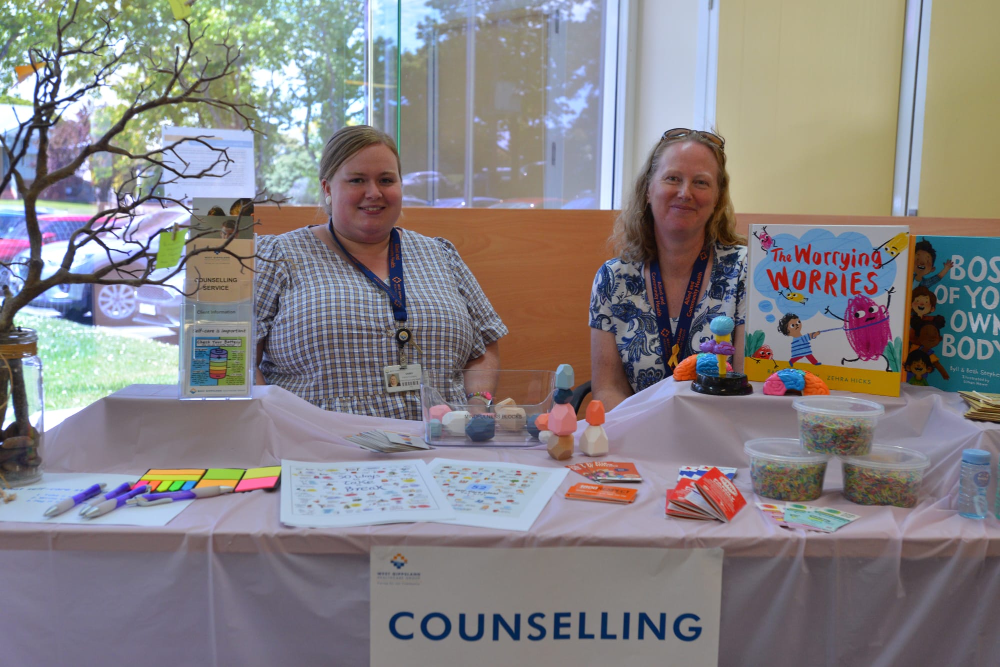 Providing information on local counselling services on offer at the community health open day are family counsellors Gabby Martin (left) and Karen Chandler.
