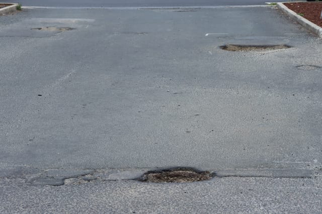 Pot Holes Woolies Carpark - 10.02.2022