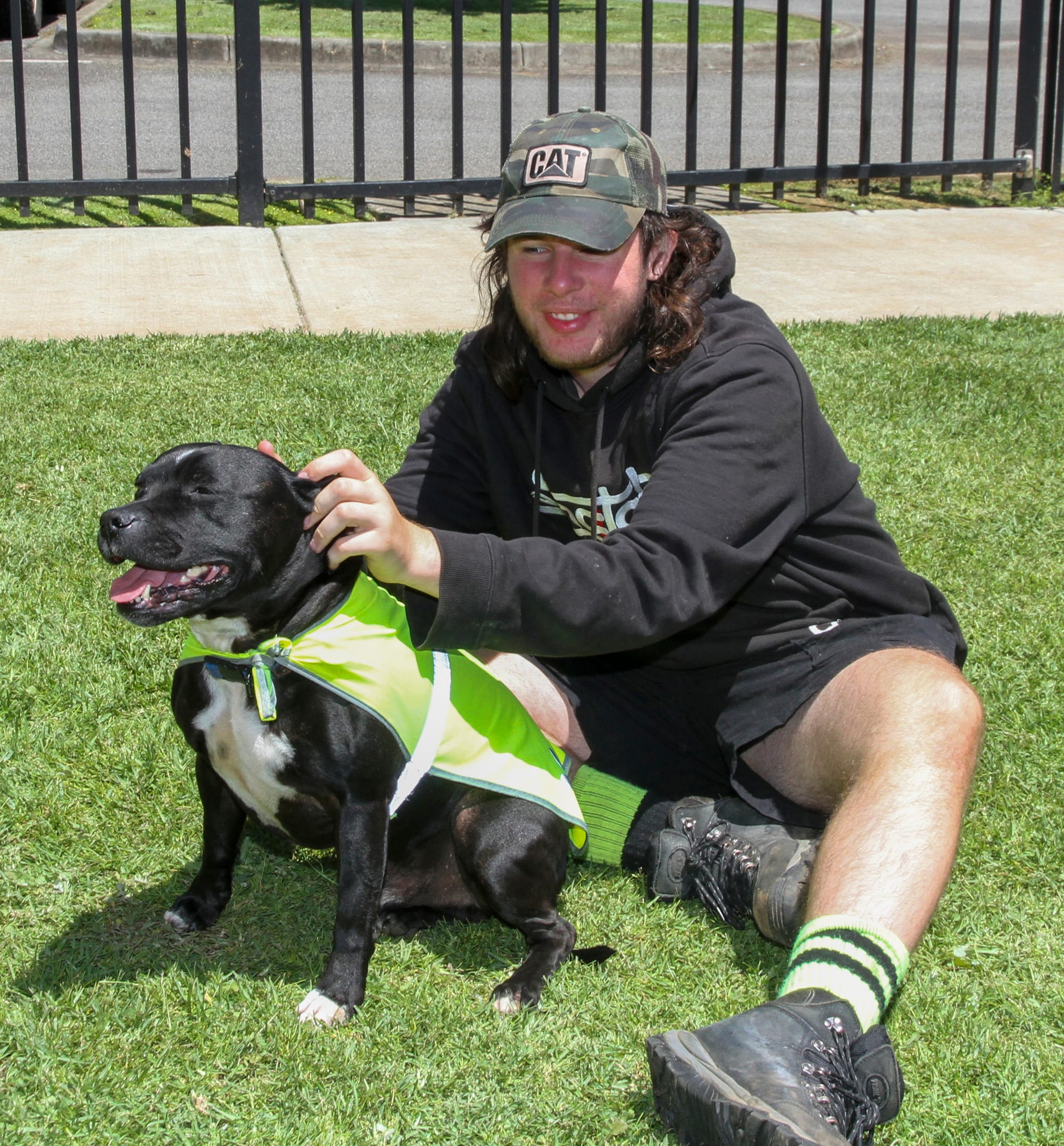 Student Alex with Ajay the dog.