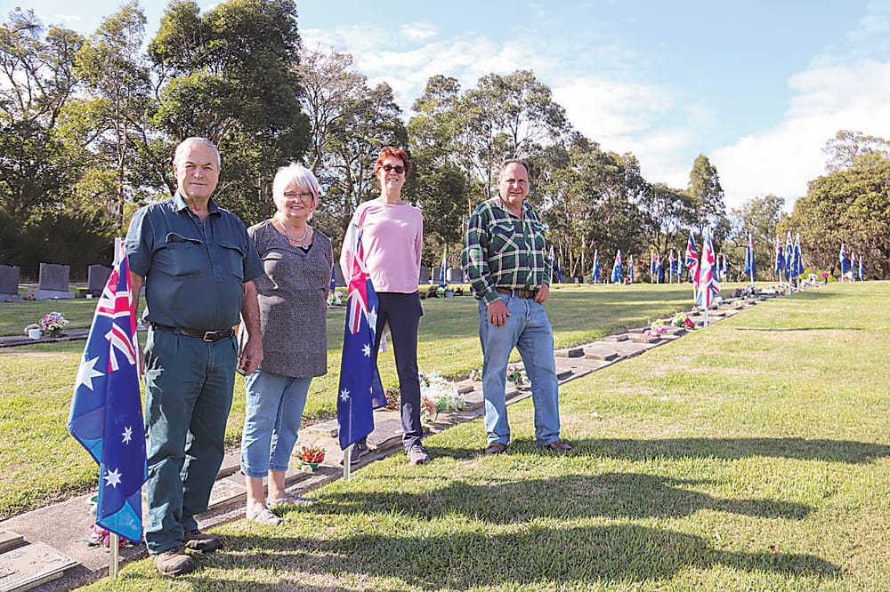 Veterans honoured with national flags post image