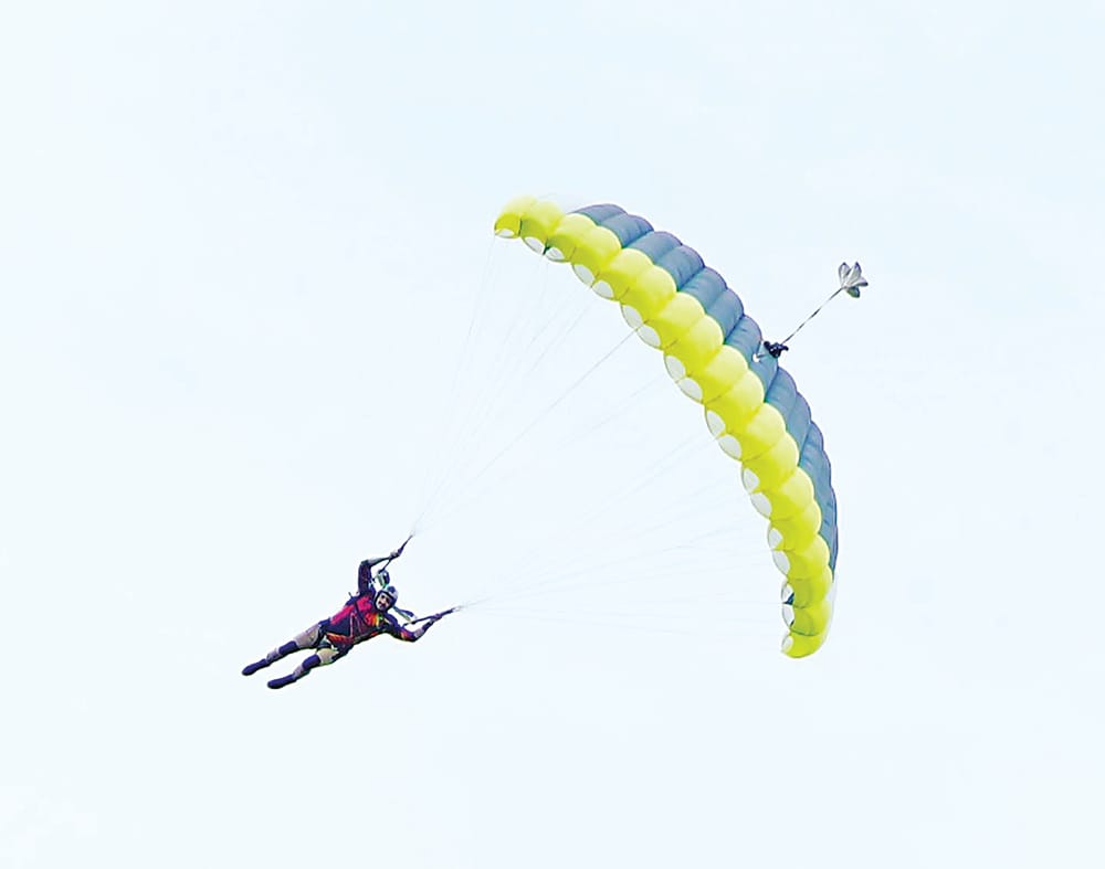 Teacher dives to victory post image