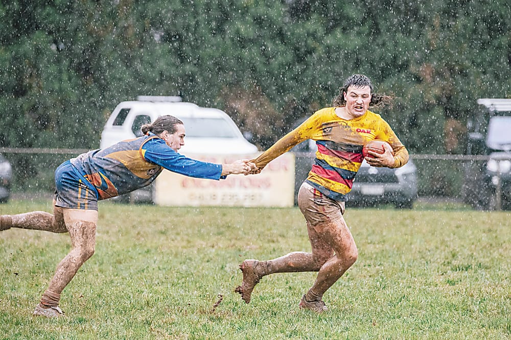 Crows hold on against Eagles in the mud post image