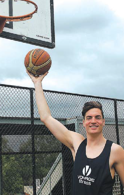Tall Tim trains for basketball post image