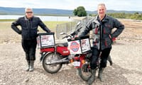 Postie bike adventure supports regional health post image